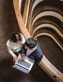 two people reading report
